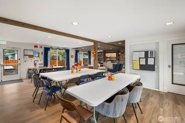 a kitchen that has a refrigerator and a stove