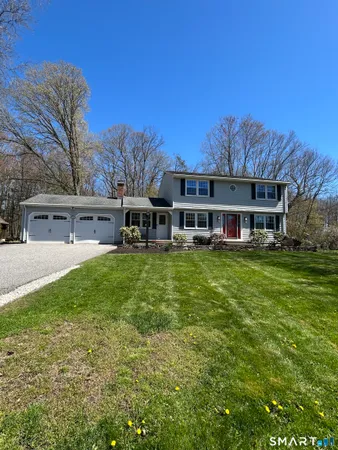 a view of a house with a big yard