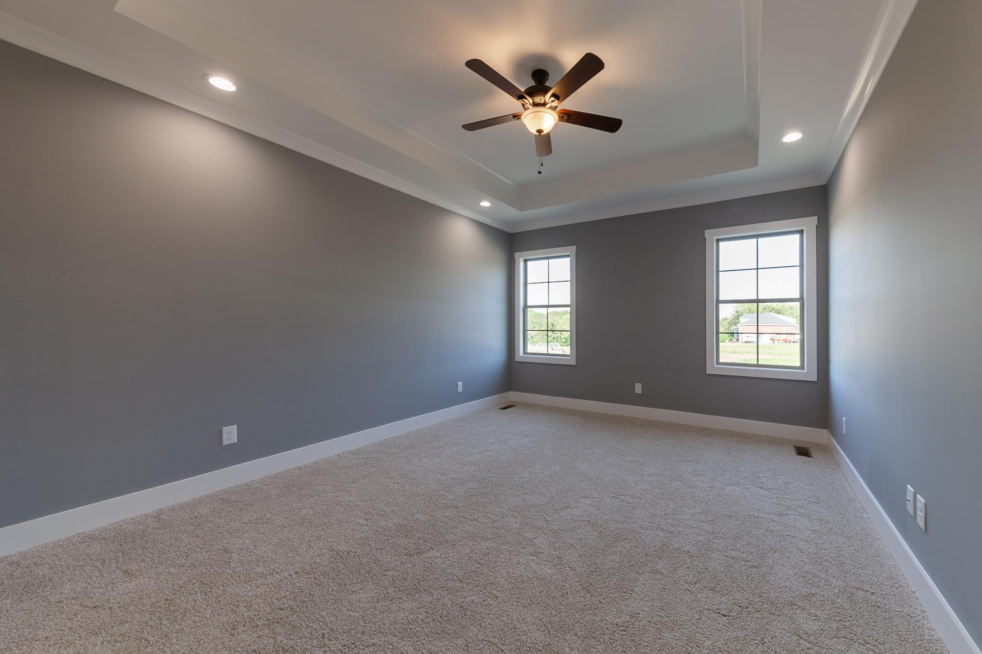 585 Sugar Flat Road Lebanon, TN 37087 - Photo 14 of 29 an empty room with a window and a fan
