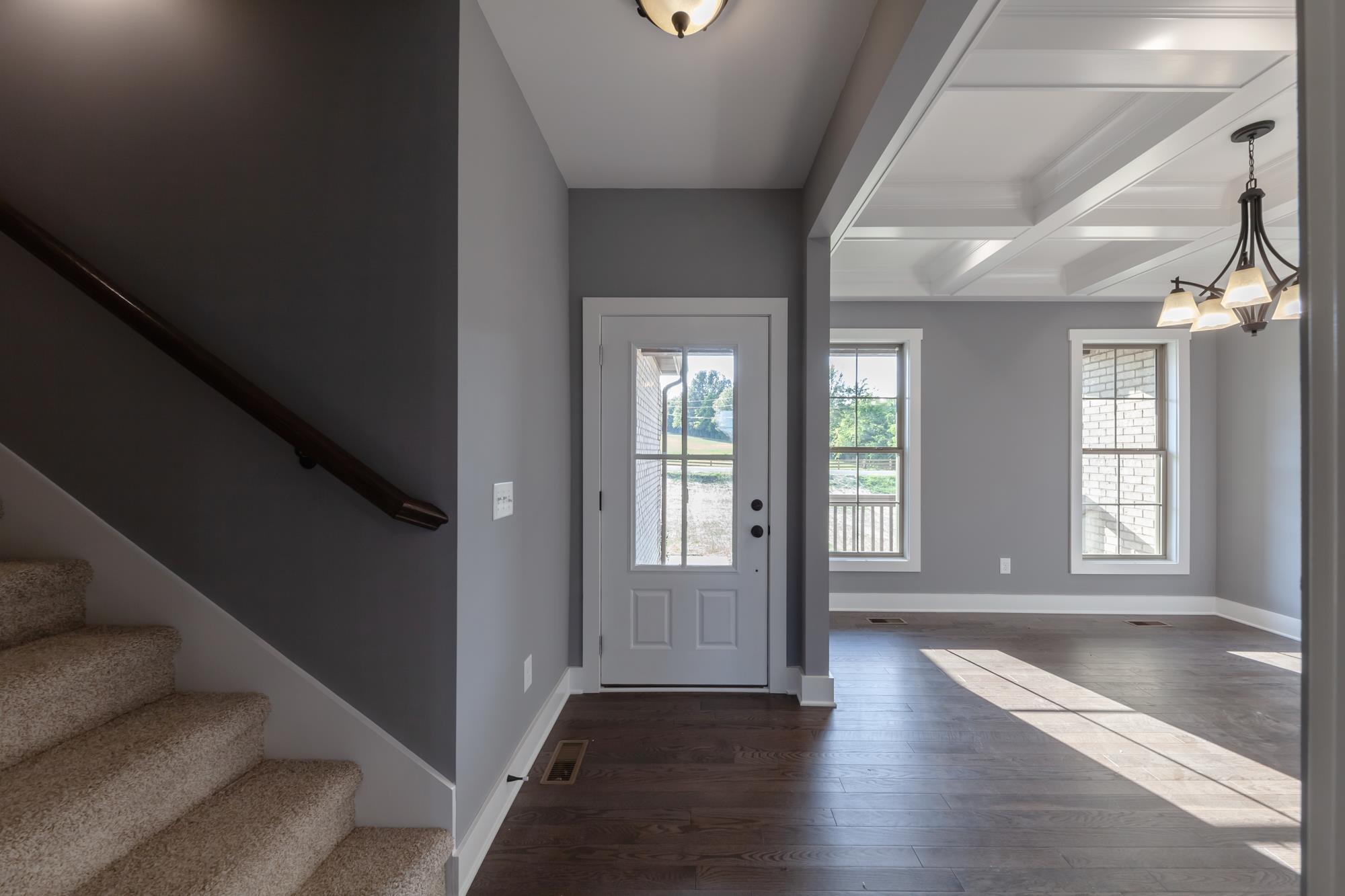 585 Sugar Flat Road Lebanon, TN 37087 - Photo 4 of 29 a view of an entryway with wooden floor and front door
