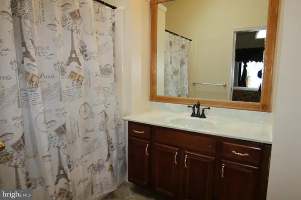 a bathroom with a toilet and a sink