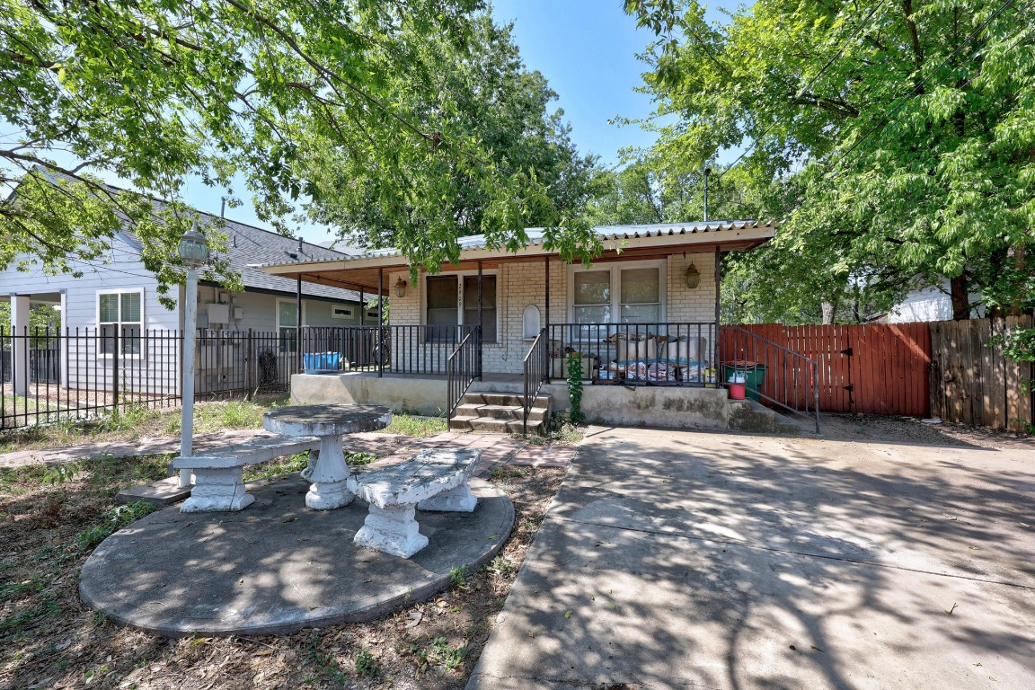 2909 East 5th Street Austin, TX 78702 - Photo 18 of 20 a view of a house with backyard and sitting area