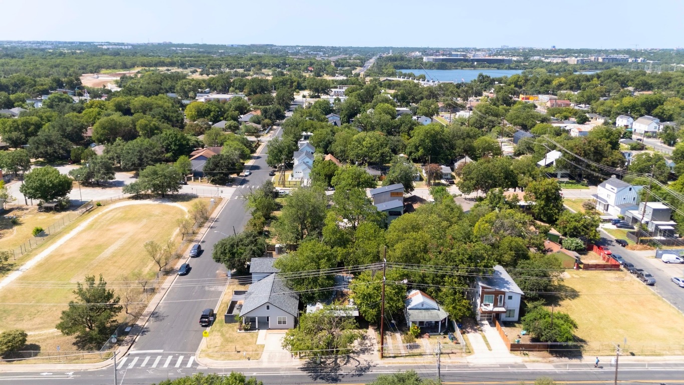 2909 East 5th Street Austin, TX 78702 - Photo 9 of 20 an aerial view of residential houses with outdoor space and trees