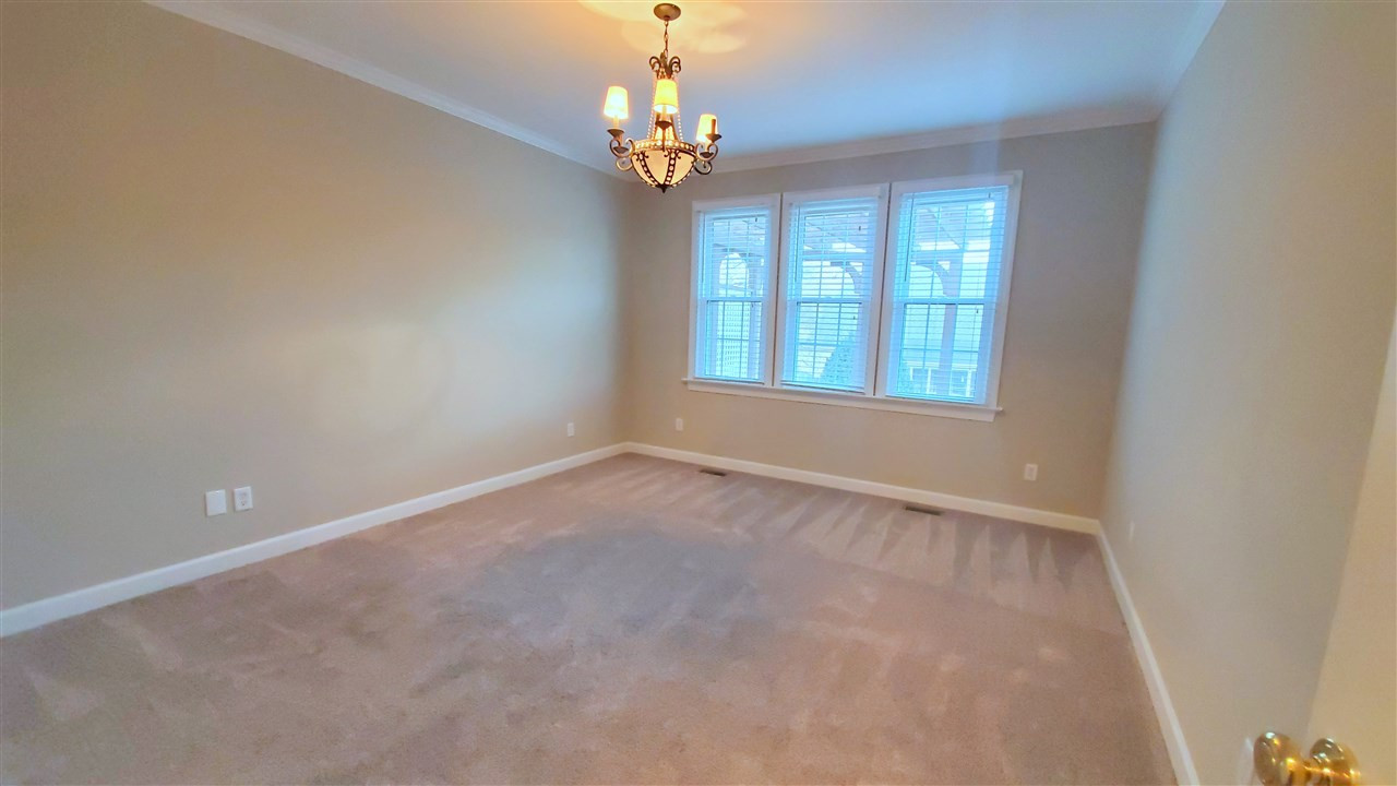 8717 Paddle Wheel Drive Raleigh, NC 27615 - Photo 10 of 30 First Floor Master Bedroom