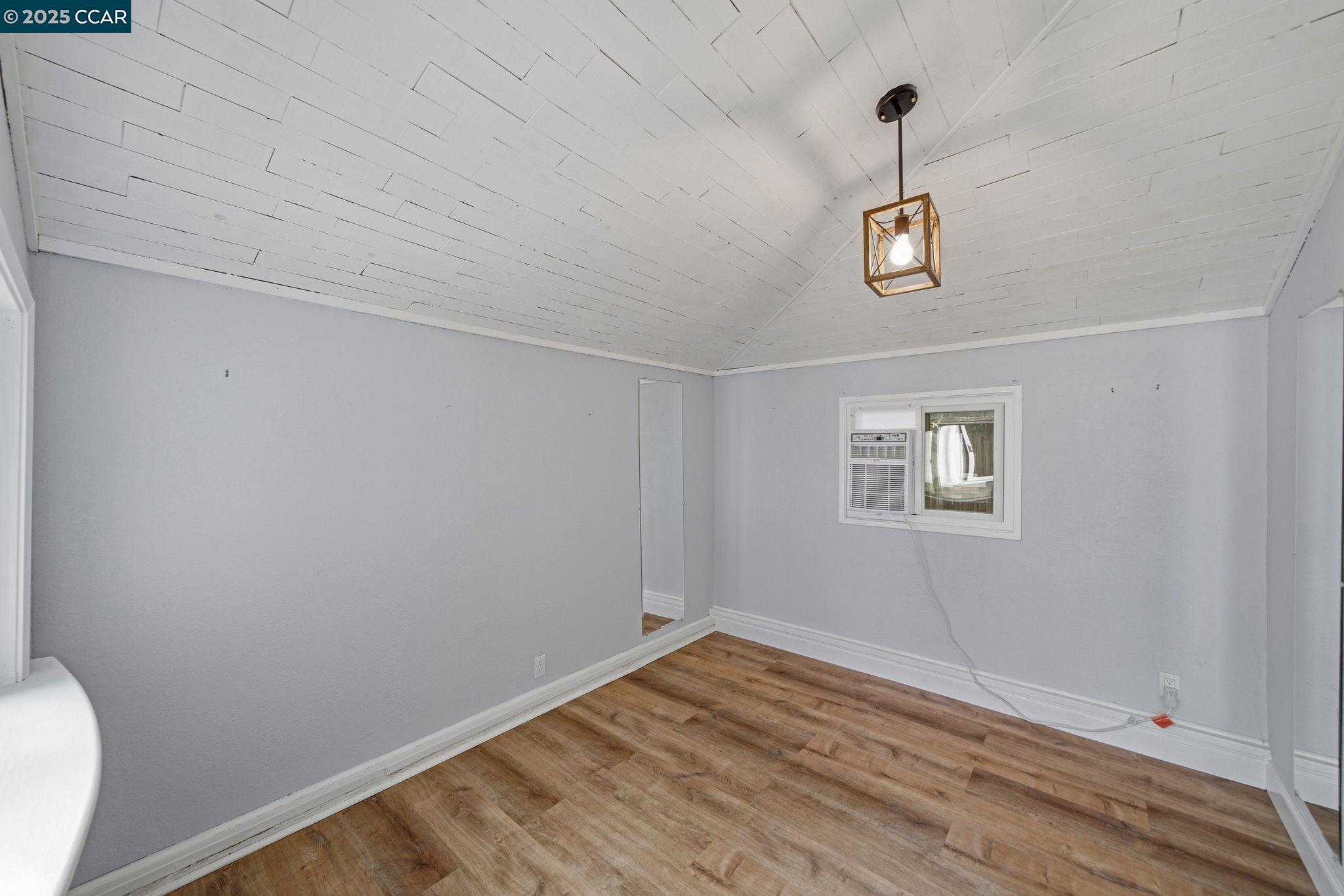 726 Grayson Road Pleasant Hill, CA 94523 - Photo 11 of 27 a view of empty room with a window and ceiling fan