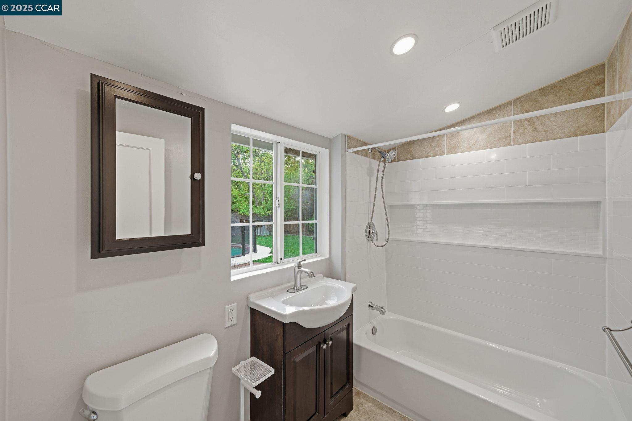 726 Grayson Road Pleasant Hill, CA 94523 - Photo 13 of 27 a bathroom with a sink toilet and shower