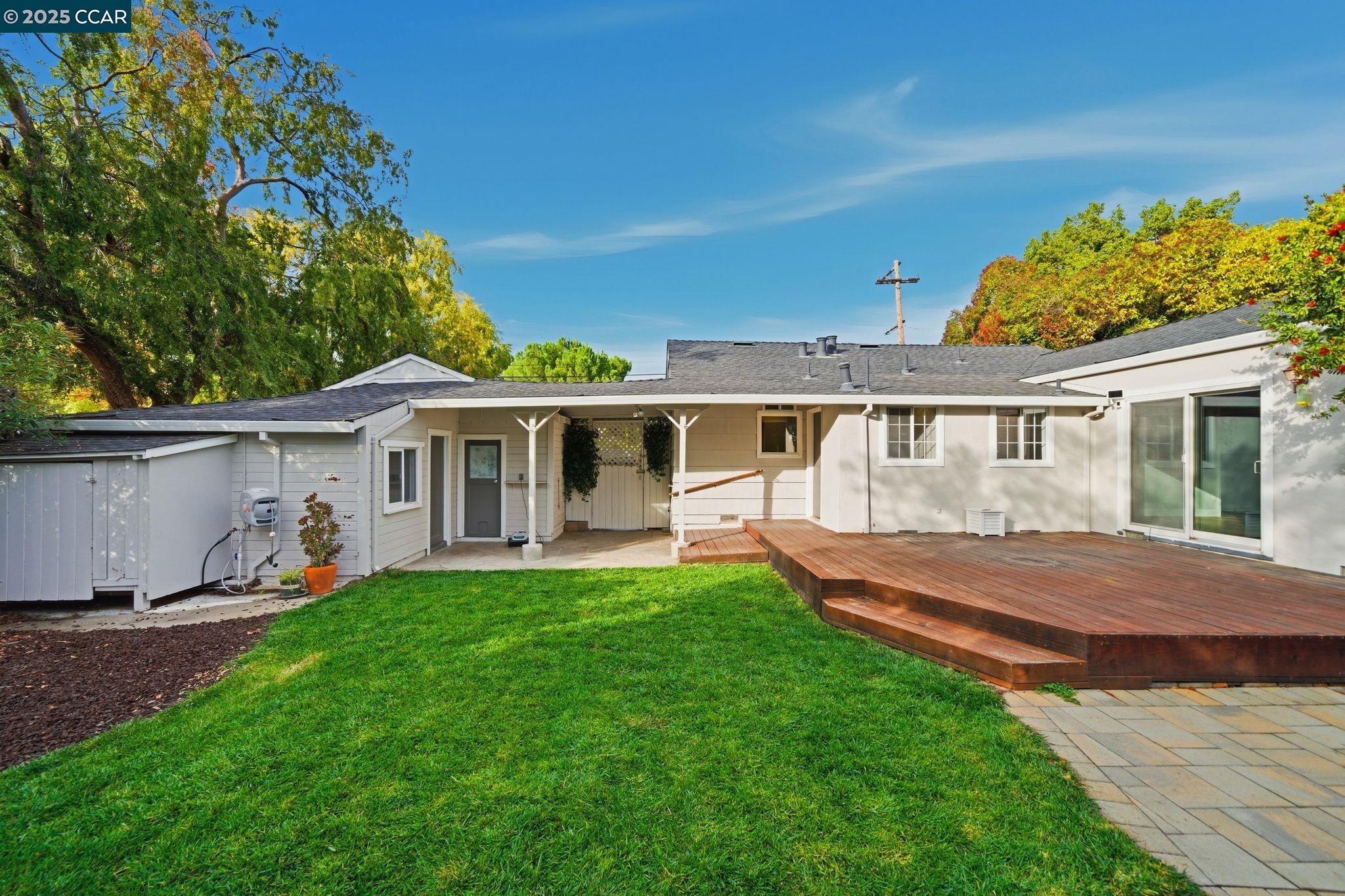 726 Grayson Road Pleasant Hill, CA 94523 - Photo 17 of 27 a view of a house with a yard and sitting area