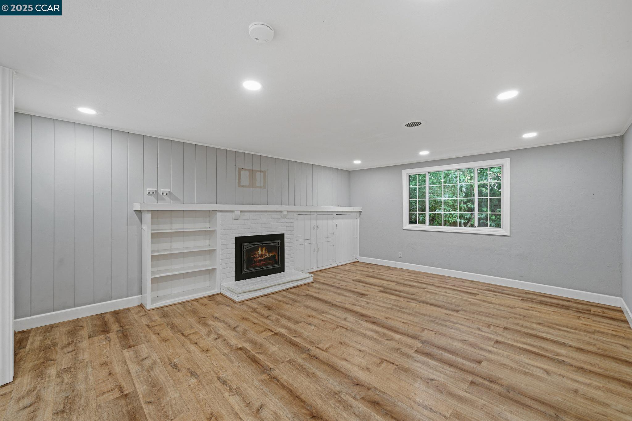 726 Grayson Road Pleasant Hill, CA 94523 - Photo 3 of 27 a view of a livingroom with a fireplace and window