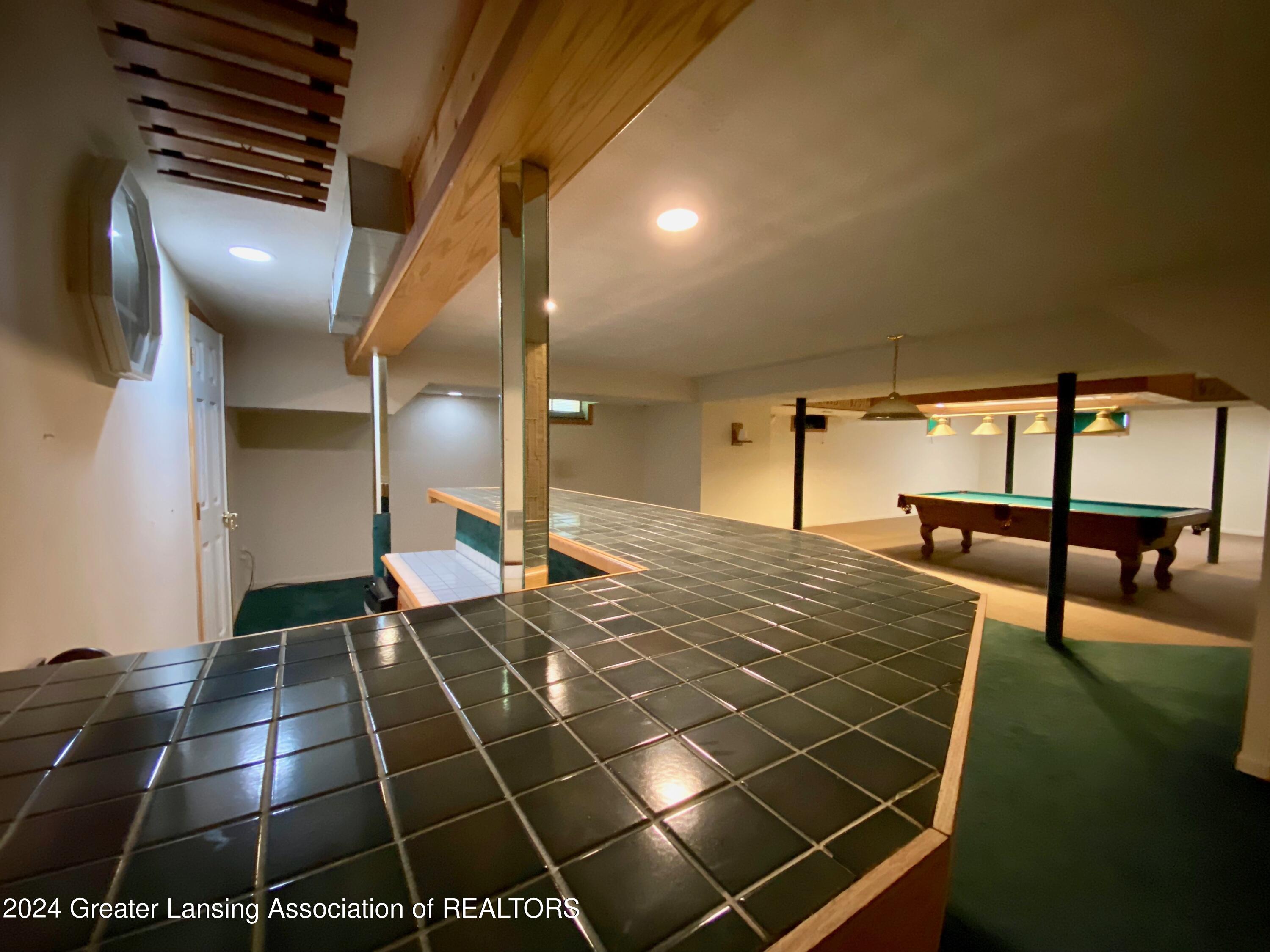 1526 Riley Ridge Drive Lansing, MI 48917 - Photo 43 of 52 from sauna to pool game