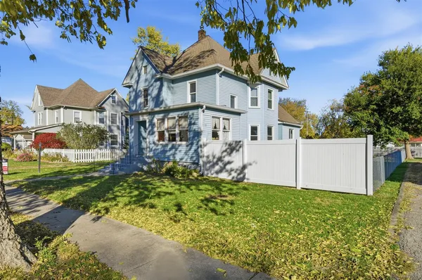 front view of a house with a yard