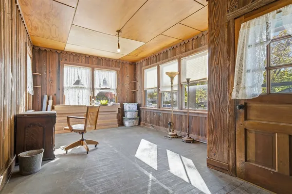 a room with table and windows