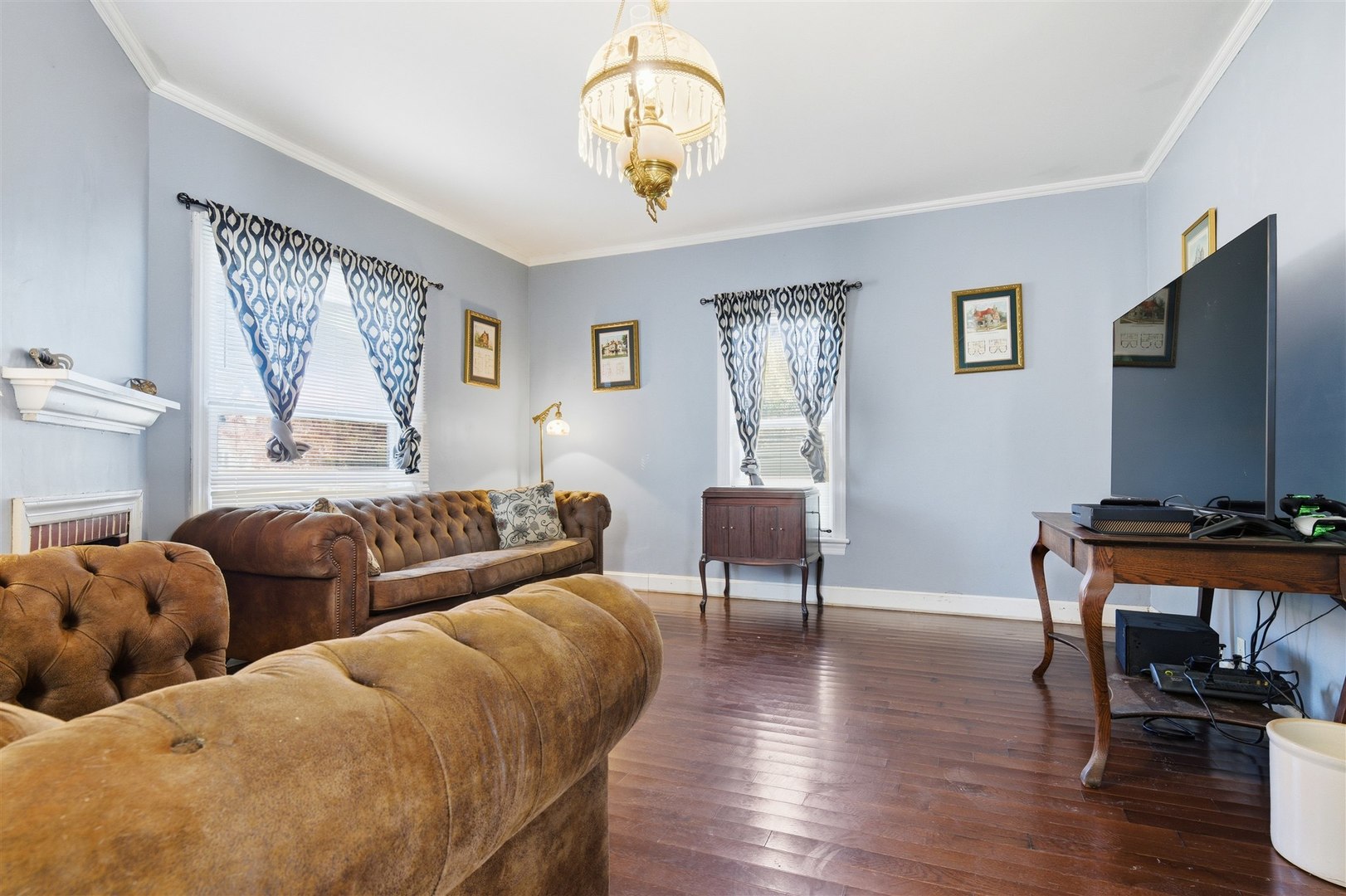208 North Jackson Street Flanagan, IL 61740 - Photo 6 of 30 a living room with furniture a window and wooden floor