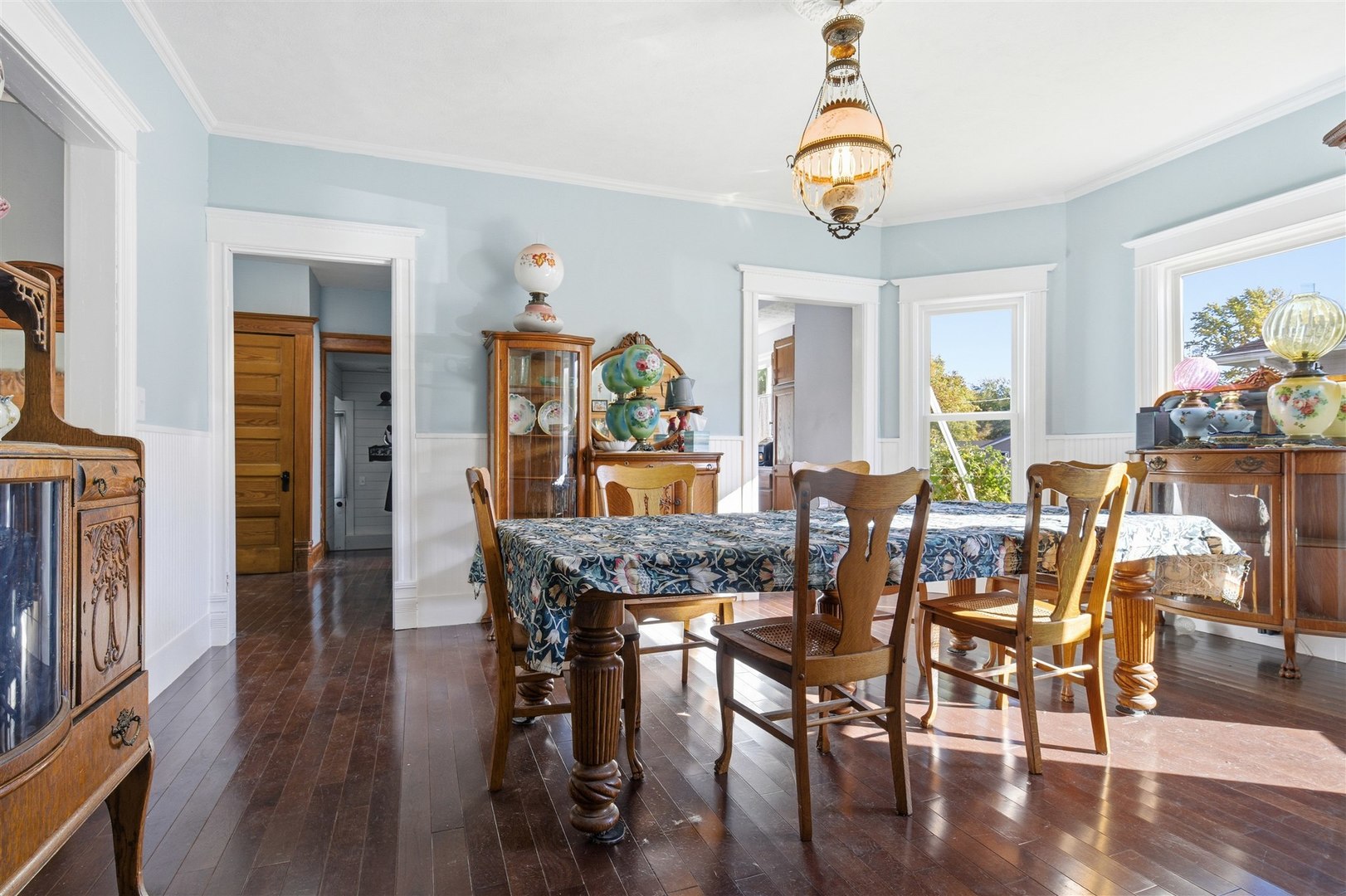 208 North Jackson Street Flanagan, IL 61740 - Photo 9 of 30 a dining room with furniture a chandelier and wooden floor