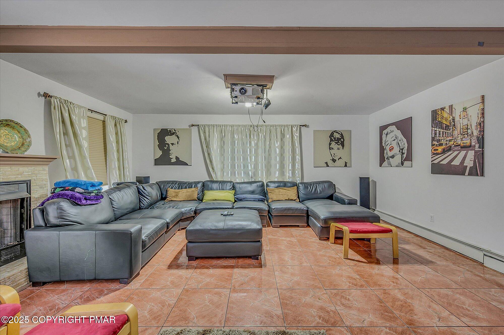 161 Beaver Dam Road Long Pond, PA 18334 - Photo 15 of 53 a living room with furniture and a couch