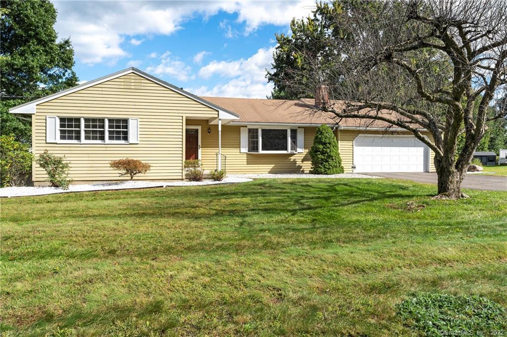 20 Back Lane Wethersfield, CT 06109 - Photo 1 of 1 a front view of house with yard and green space