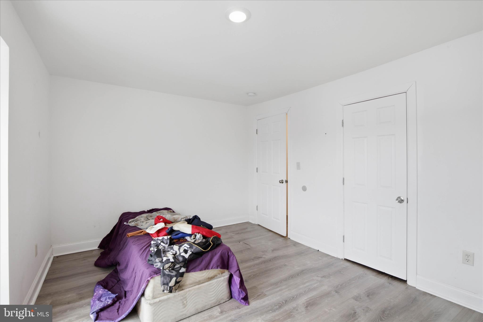 1910 North 3rd Street Harrisburg, PA 17102 - Photo 15 of 18 a bedroom with a bed and a dresser