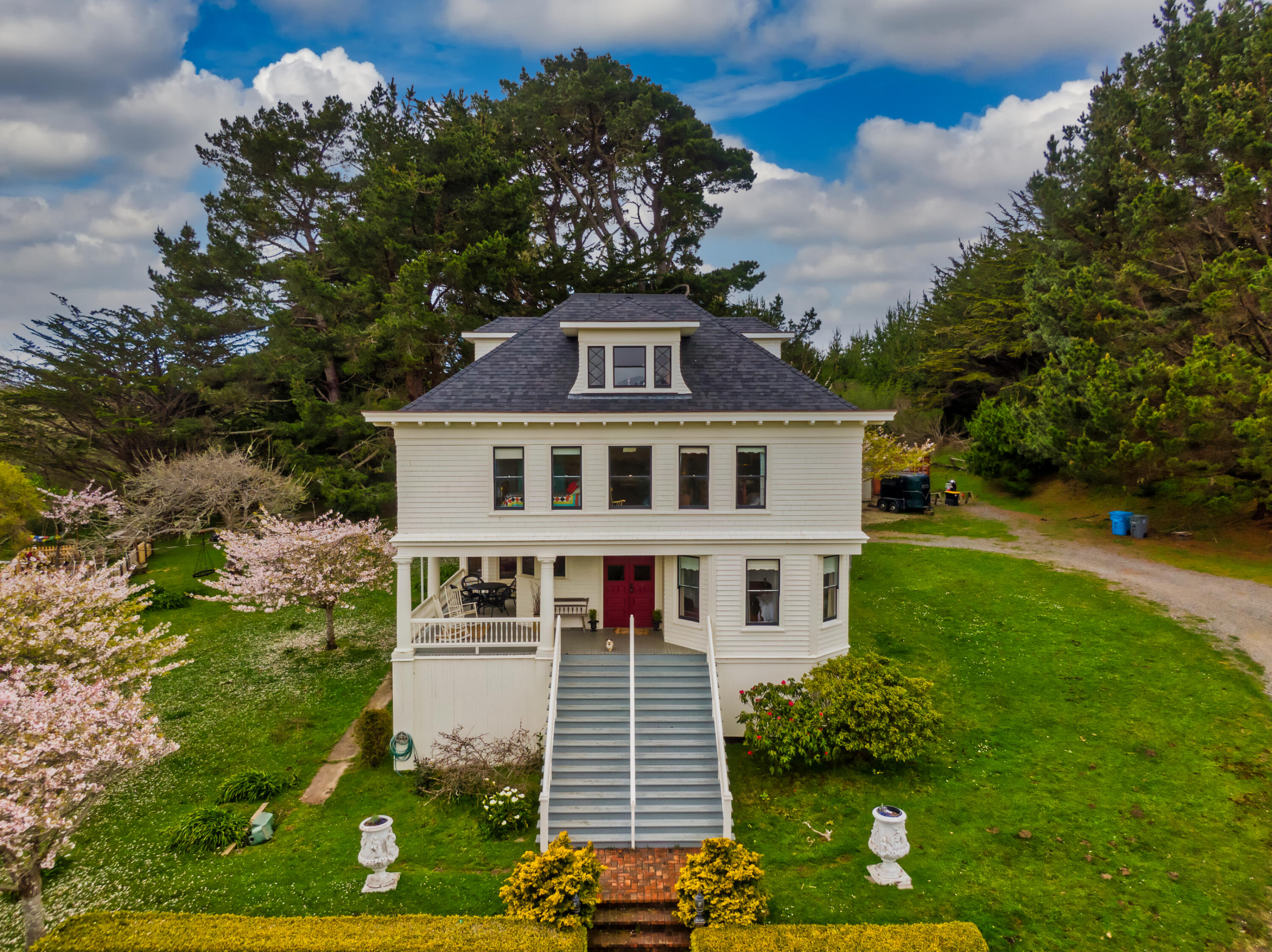a front view of a house with a yard