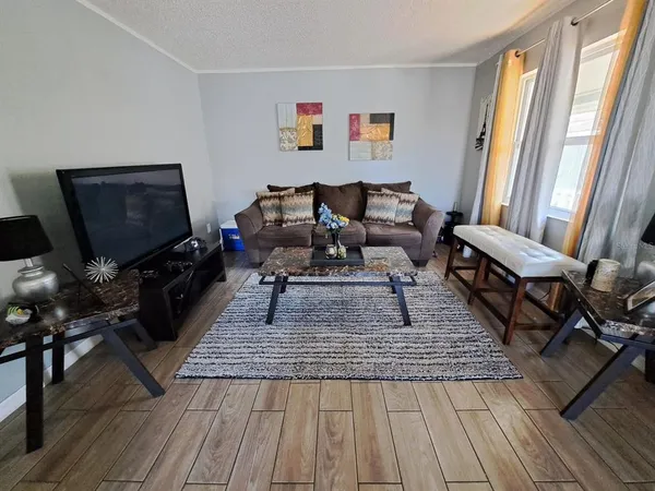 a kitchen with stainless steel appliances a stove and a refrigerator