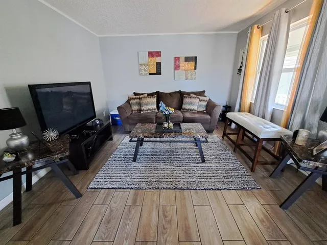 a kitchen with stainless steel appliances a stove and a refrigerator