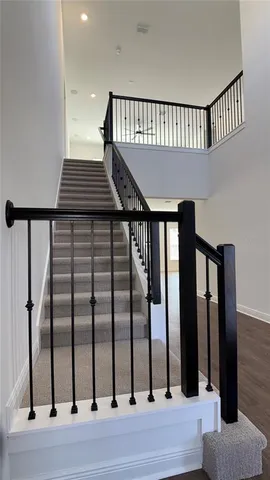 a bathroom with a toilet and a bathtub