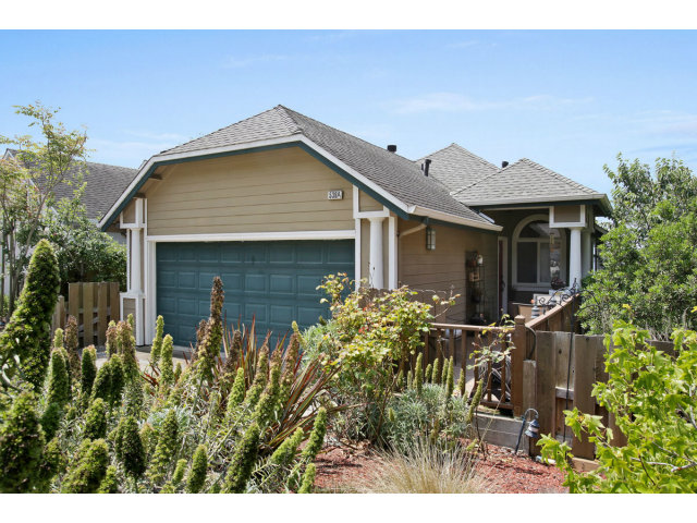 538 Monterey Road, Unit A Pacifica, CA 94044 - Photo 1 of 18 a front view of house with yard and trees around