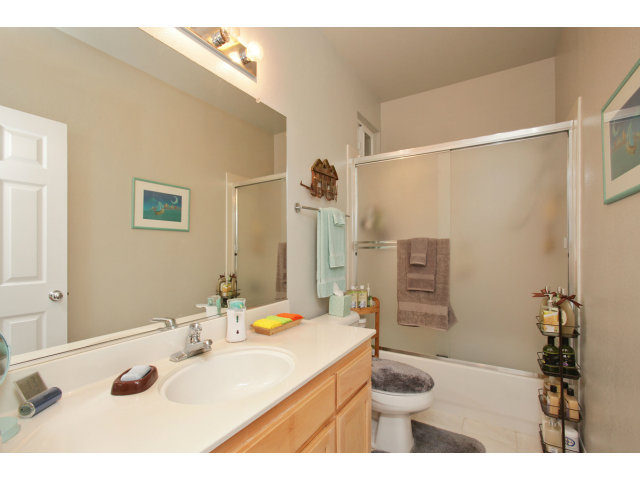 538 Monterey Road, Unit A Pacifica, CA 94044 - Photo 14 of 18 a bathroom with a sink and a mirror