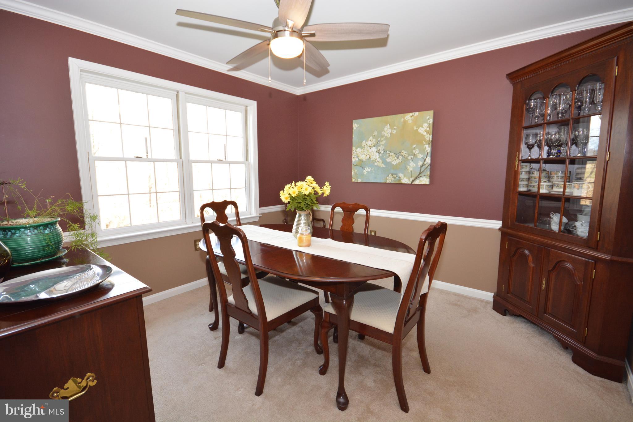 213 Bomberger Road Akron, PA 17501 - Photo 11 of 38 a view of a dining room with furniture window and outside view