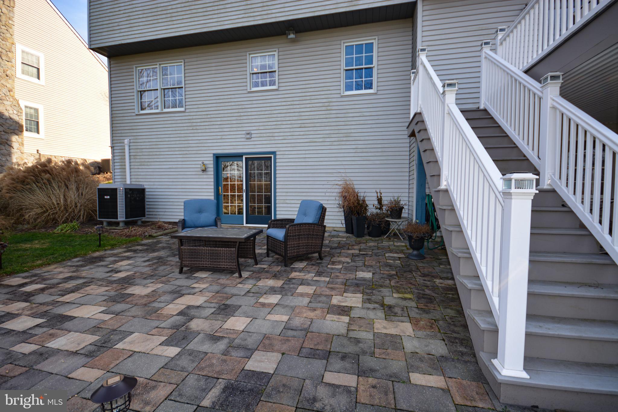 213 Bomberger Road Akron, PA 17501 - Photo 35 of 38 a backyard of a house with outdoor seating