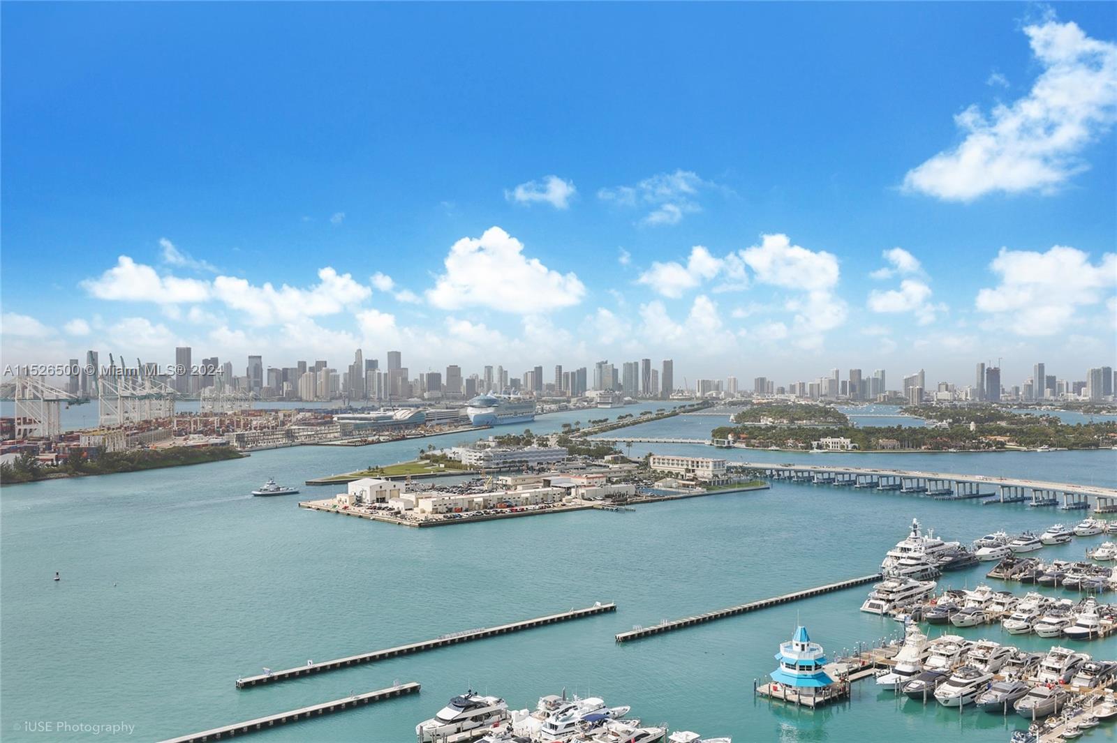 90 Alton Road, Unit 2806 Miami Beach, FL 33139 - Photo 17 of 18 a view of a lake with outdoor space