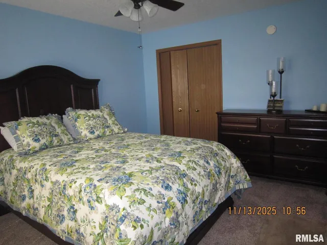 a bathroom with a mirror and shower