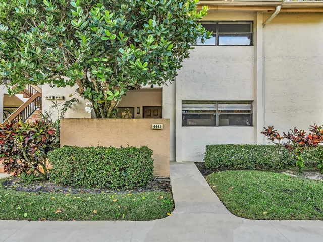 a front view of house with yard