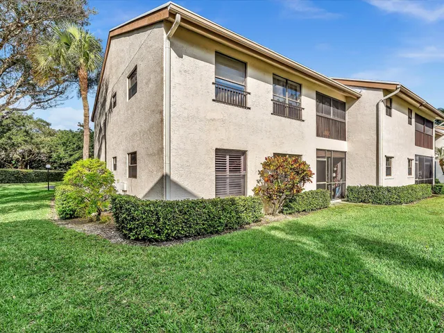 a view of swimming pool with outdoor seating
