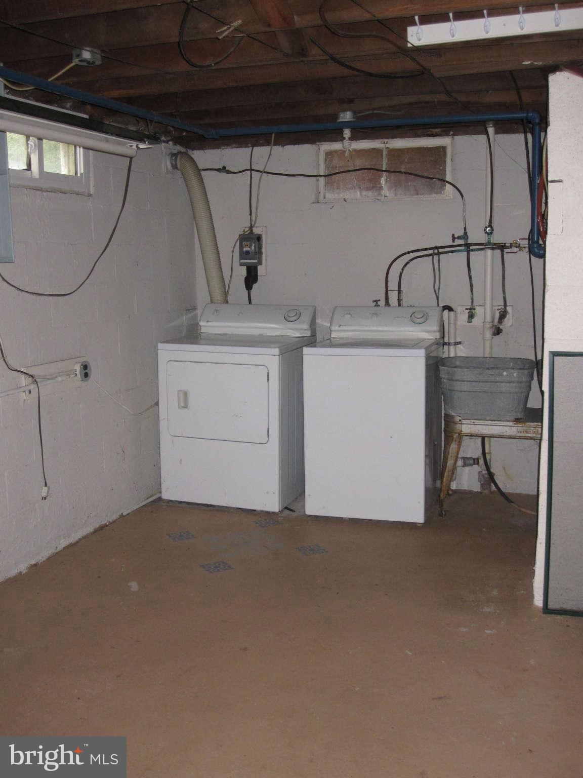 13053 Dahlgren Road King George, VA 22485 - Photo 10 of 14 Large laundry area in basement