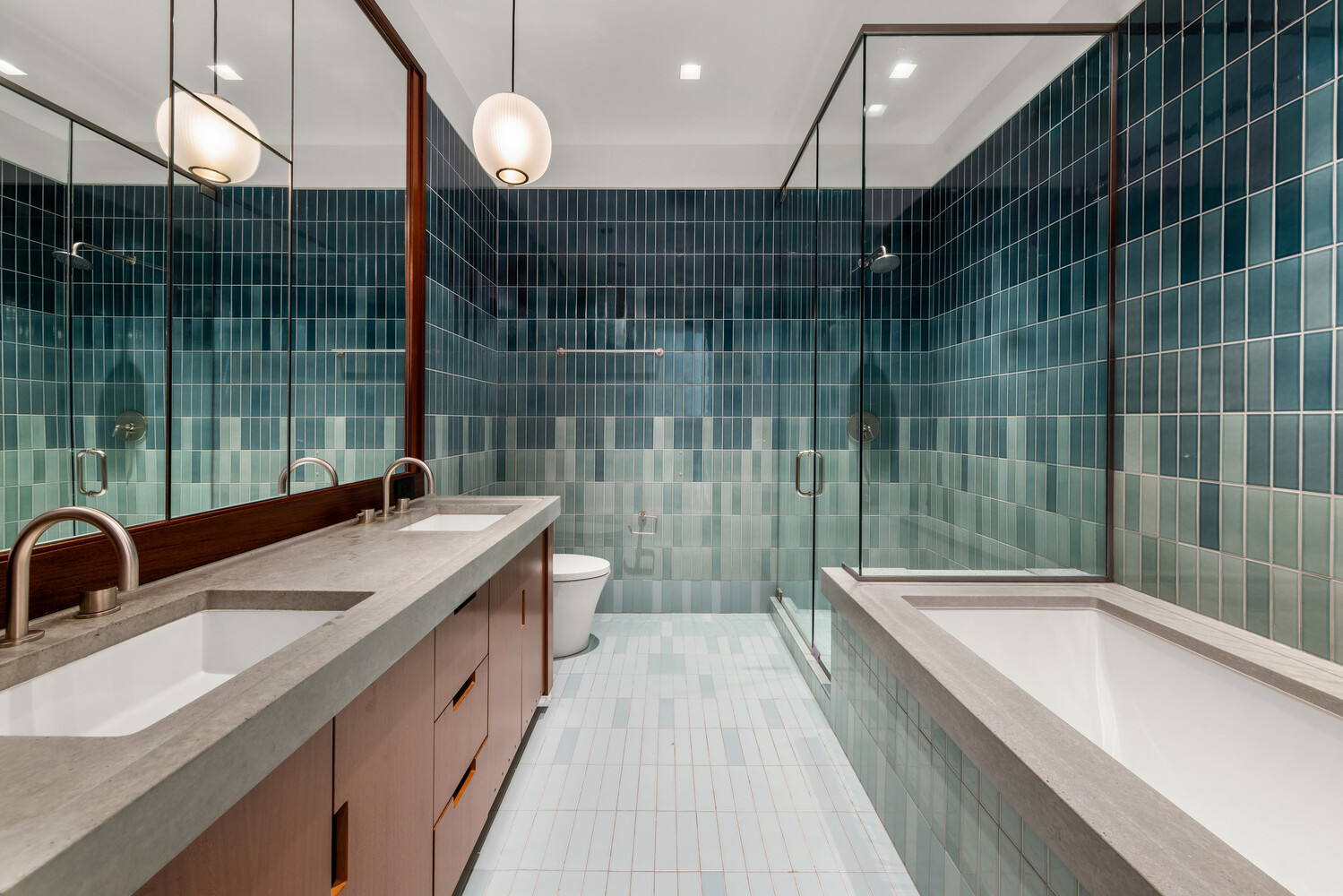 143 Reade Street, Unit 10A Manhattan, NY 10013 - Photo 15 of 18 a bathroom with a granite countertop sink a toilet and bathtub