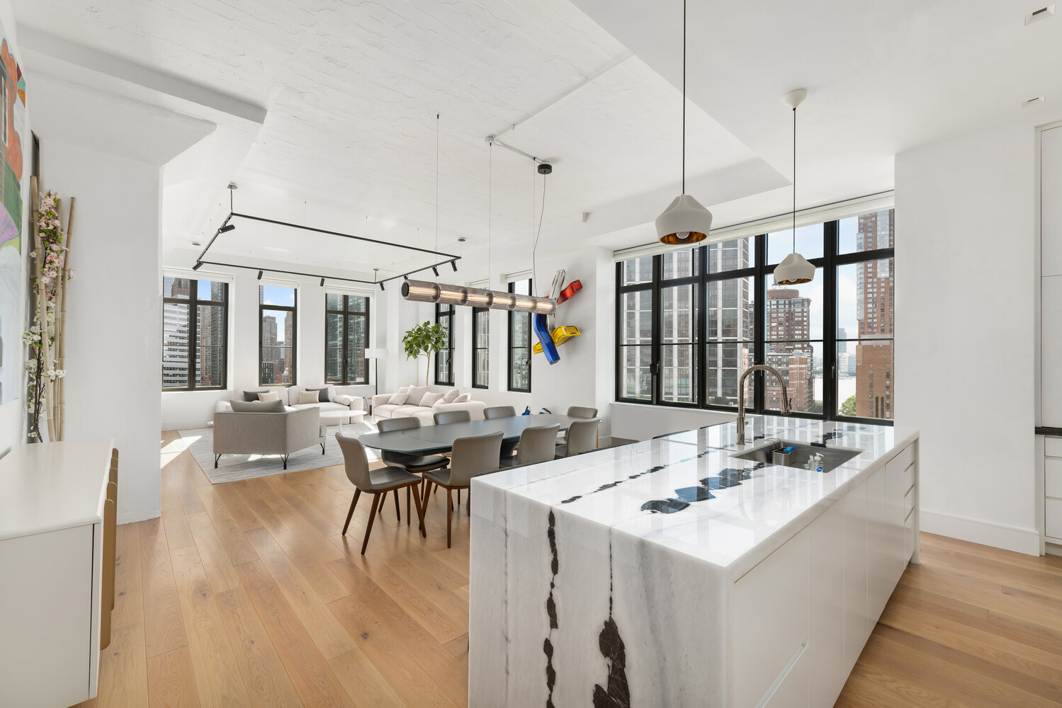 143 Reade Street, Unit 10A Manhattan, NY 10013 - Photo 2 of 18 a view of a dining room with furniture and window