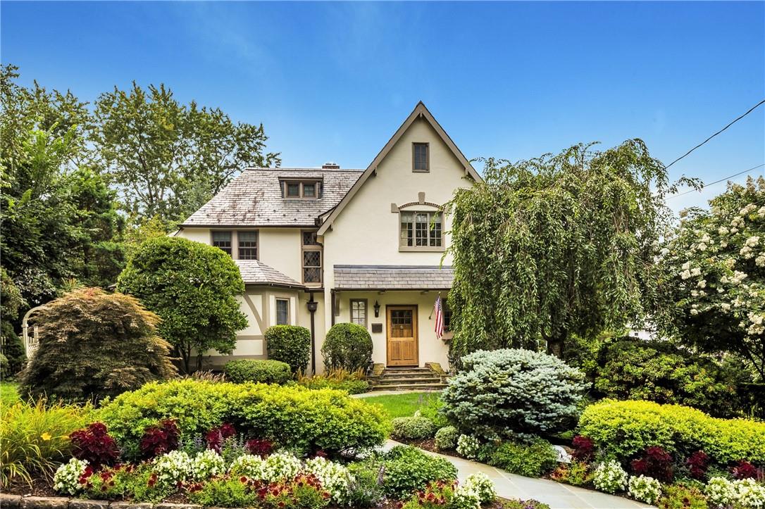 22 Sturgis Road Bronxville, NY 10708 - Photo 1 of 1 a front view of a house with a yard