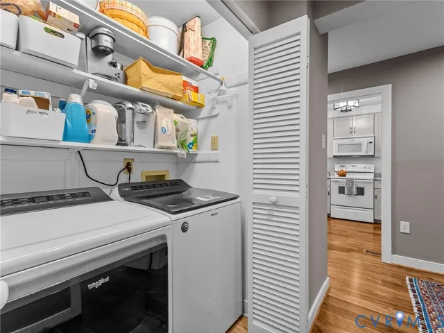 a stove top oven sitting inside of a kitchen