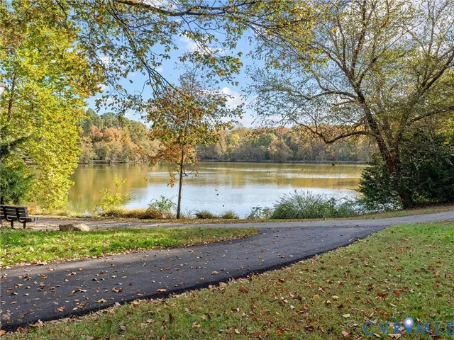 a view of a lake with a big yard