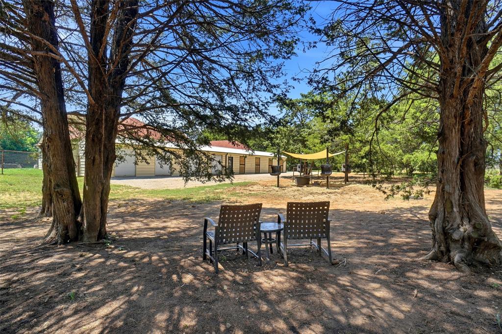 180 East Greer Road Sadler, TX 76264 - Photo 34 of 40 Place to relax between some trees