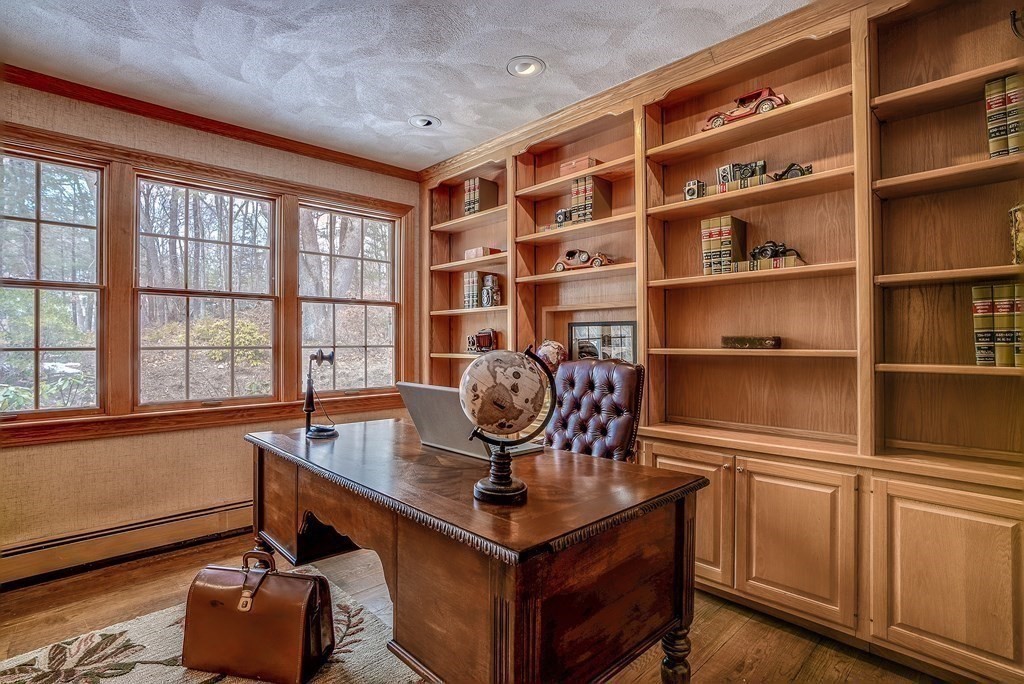 2 Sudbury Road Weston, MA 02493 - Photo 21 of 42 a view of a workspace with furniture and a window