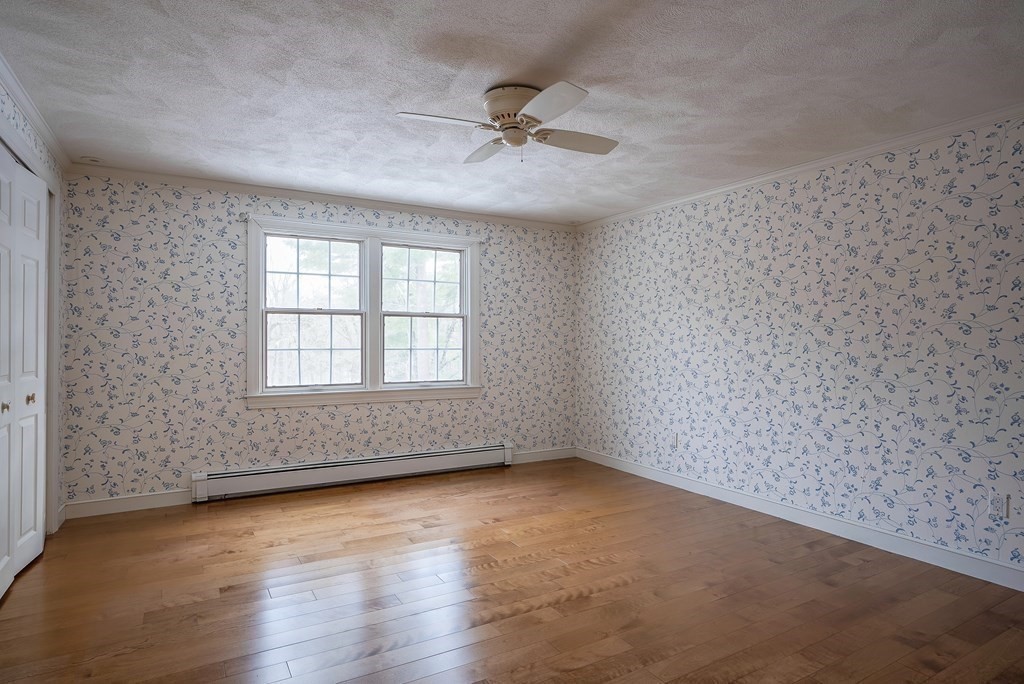 2 Sudbury Road Weston, MA 02493 - Photo 27 of 42 wooden floor in an empty room with a window