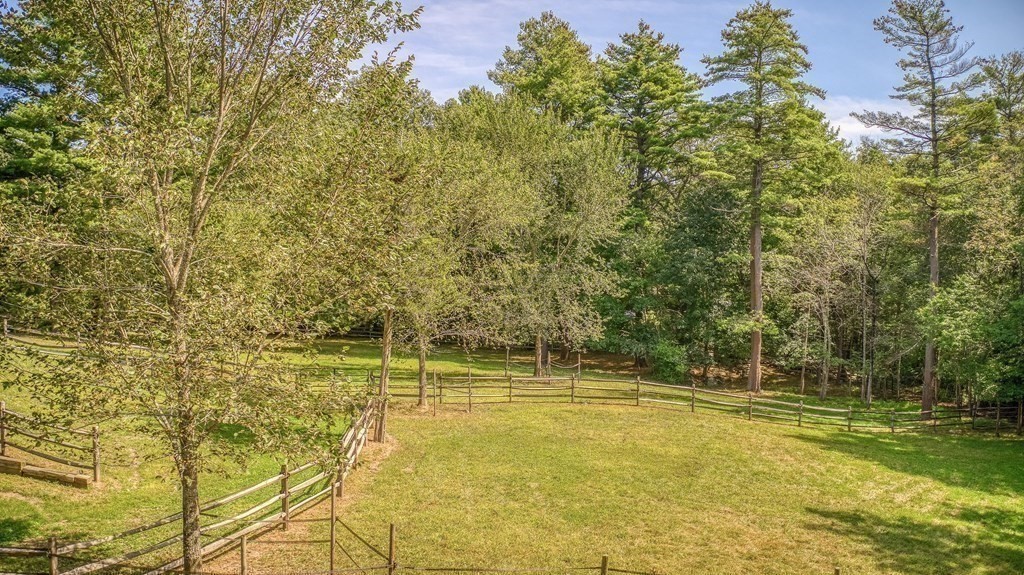 2 Sudbury Road Weston, MA 02493 - Photo 33 of 42 a view of a swimming pool with an outdoor space and seating area