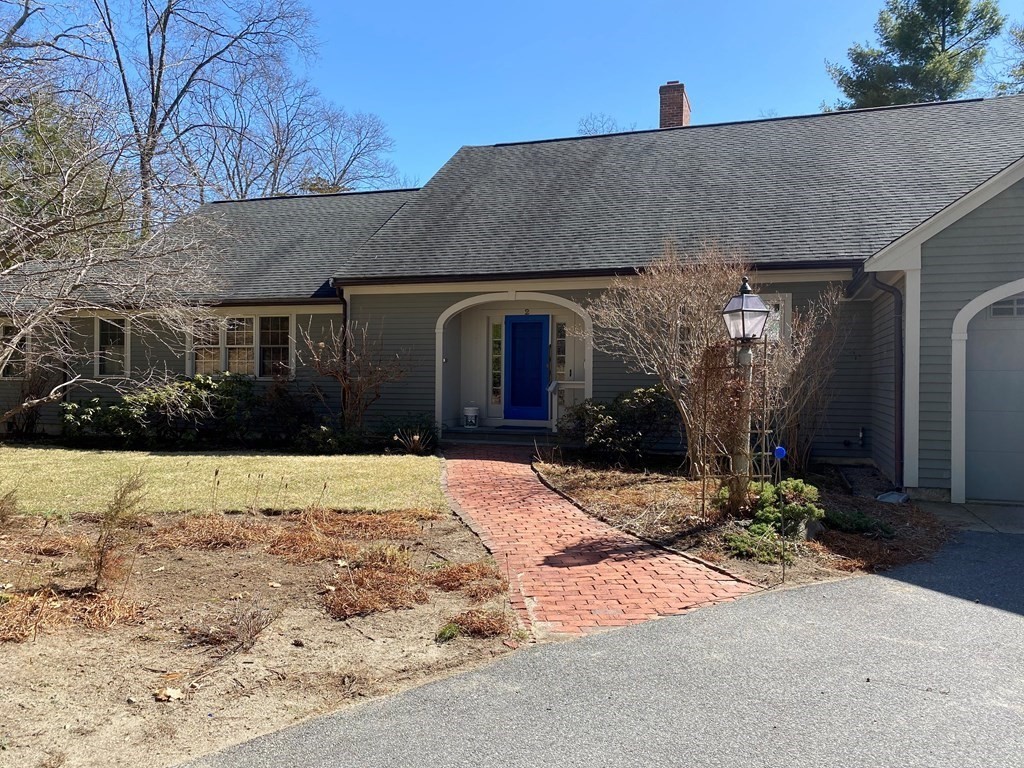 2 Sudbury Road Weston, MA 02493 - Photo 8 of 42 a front view of a house with a yard