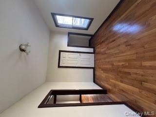 3 Dean Place Poughkeepsie, NY 12601 - Photo 3 of 10 Unfurnished bedroom with dark wood finished floors and a closet