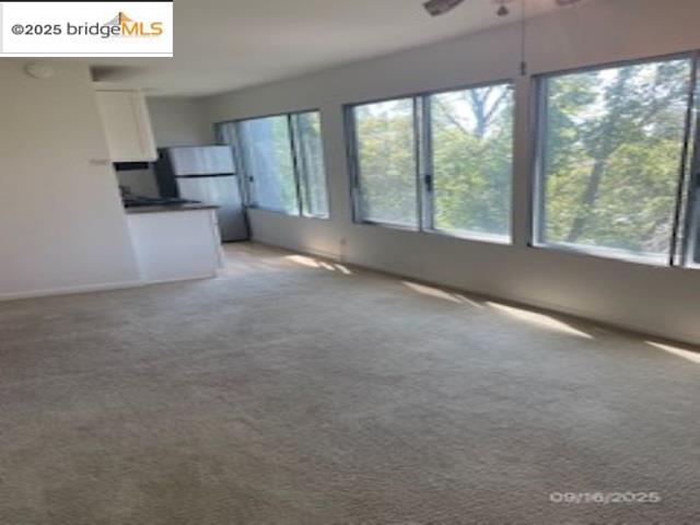 455 Crescent Street, Unit 312 Oakland, CA 94610 - Photo 2 of 5 an empty room with windows