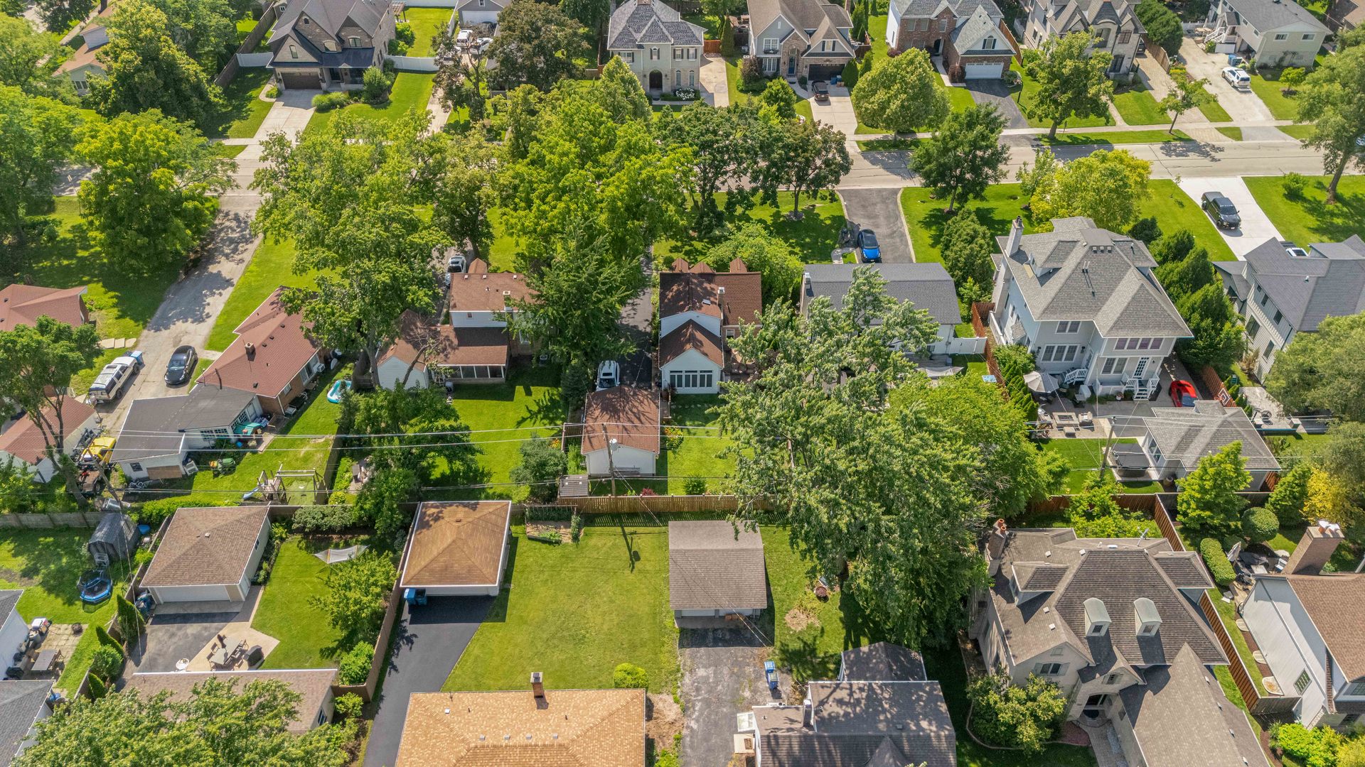 725 North County Line Road Hinsdale, IL 60521 - Photo 29 of 34 an aerial view of a house with a yard and plants