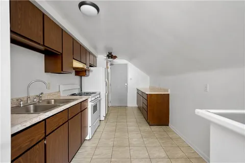 a kitchen with a cabinets and sink