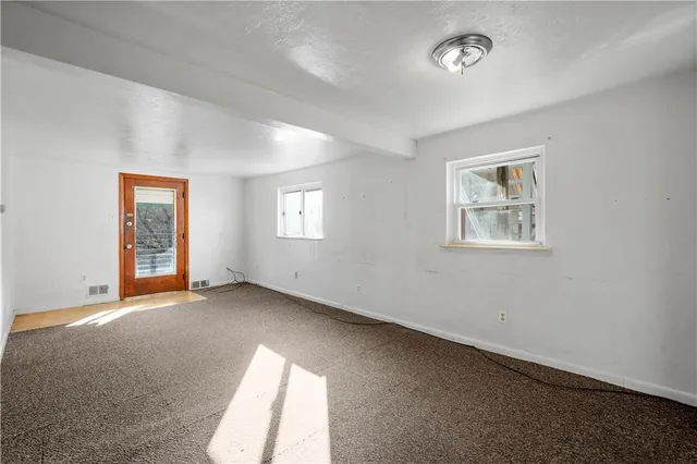 a view of an empty room with window