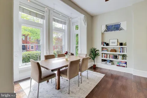 a view of a livingroom with furniture and a potted plant