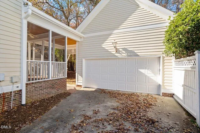 a view of a house with a door and wooden walls